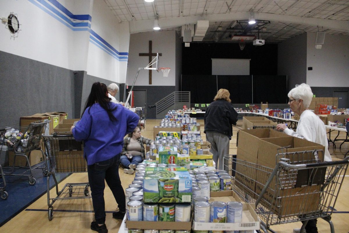 Members help set up for Operation holiday.