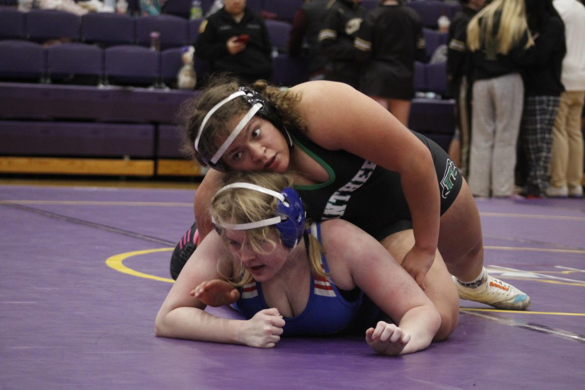 Junior Chole Spears pinning another player down