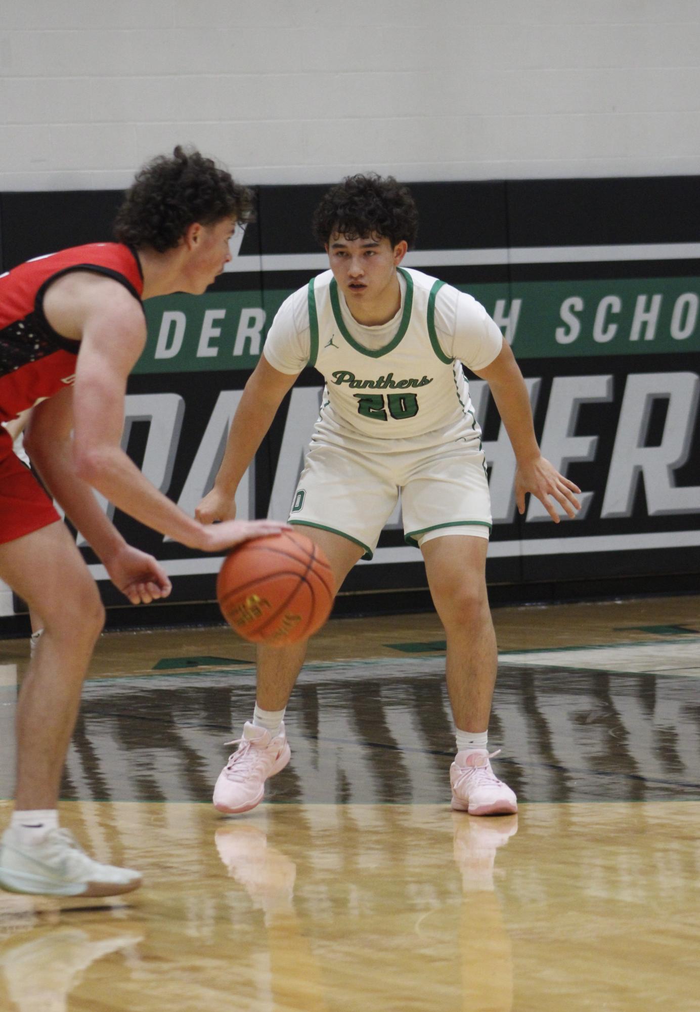 Varsity Boys basketball vs. McPherson (Photos by Persephone Ivy)