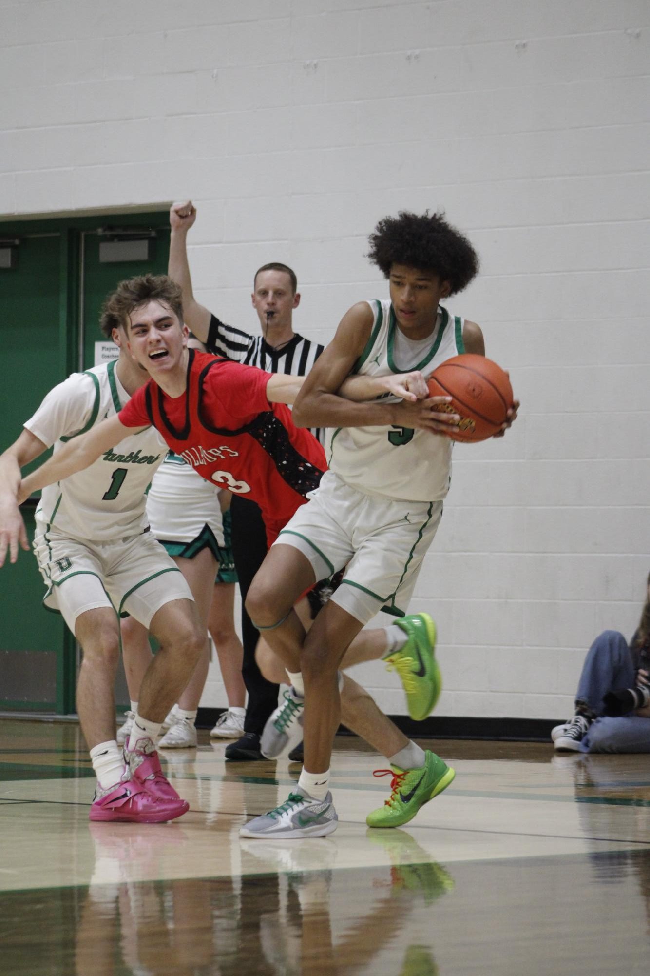 Varsity Boys basketball vs. McPherson (Photos by Persephone Ivy)