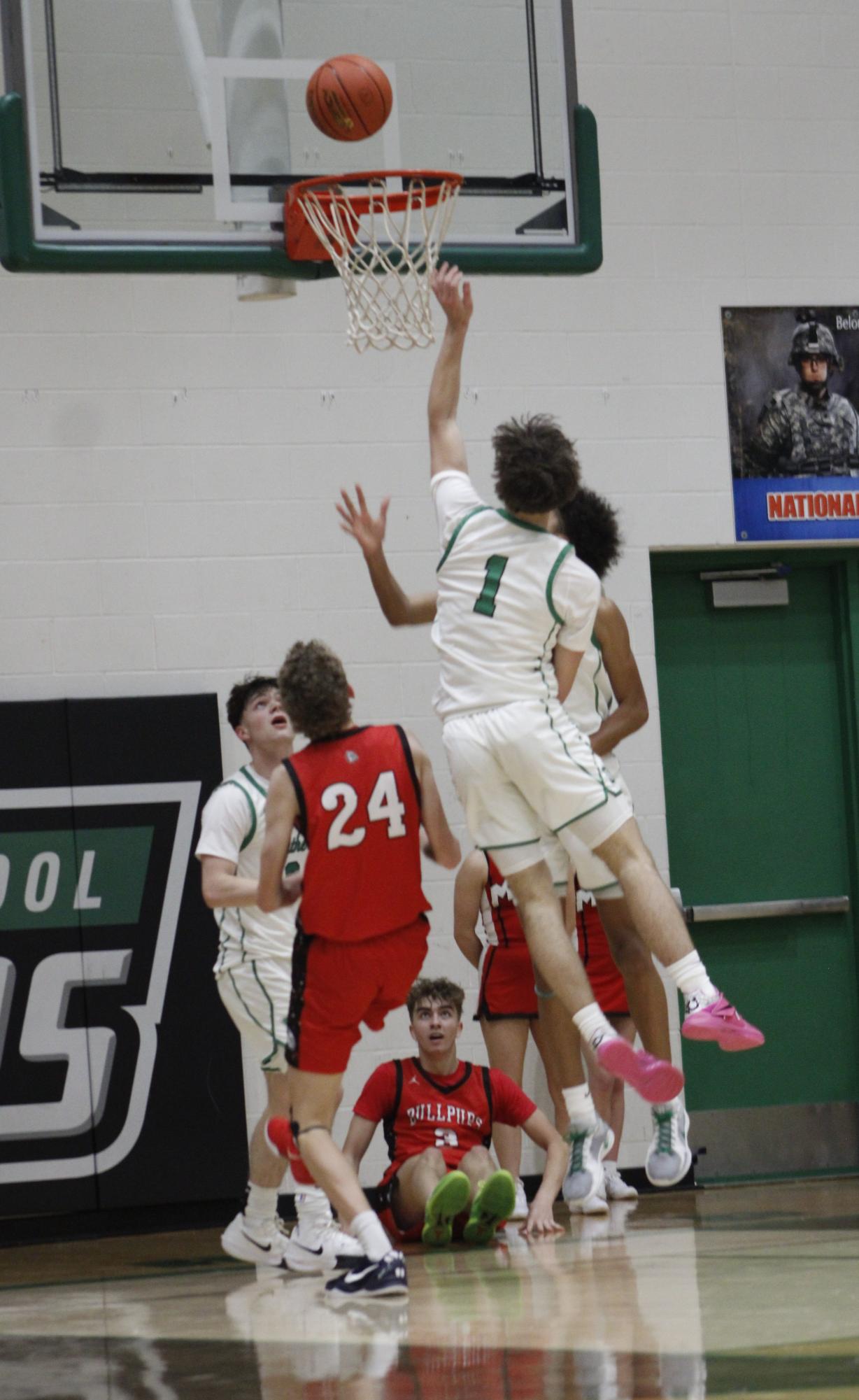 Varsity Boys basketball vs. McPherson (Photos by Persephone Ivy)