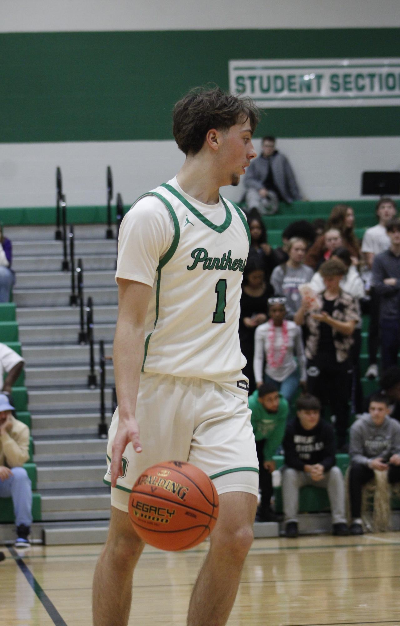 Varsity Boys basketball vs. McPherson (Photos by Persephone Ivy)