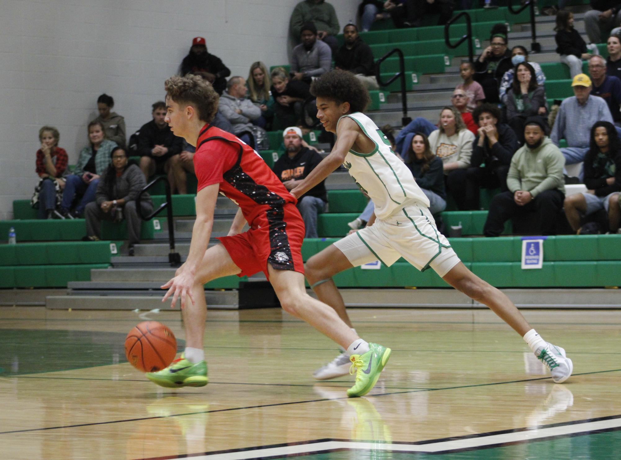 Varsity Boys basketball vs. McPherson (Photos by Persephone Ivy)