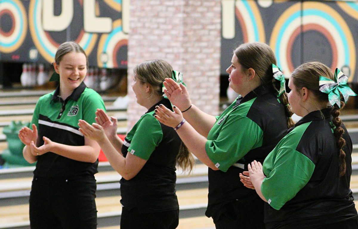 Both varsity bowling teams took first place in a home meet against Trinity and Mulvane High School. The boys team led with a combined score of 2,854 pins, while the girls team scored 1,870 pins.