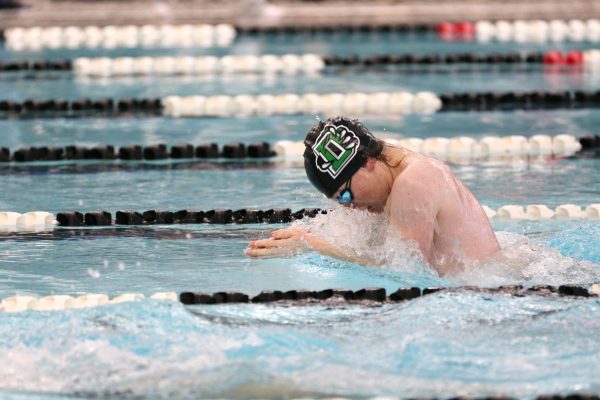 The boys swim team took first place at Campus, finishing with 328 points and edging out Campus High School by 15 points. DHS seniors were recognized and celebrated for their dedication to the team.