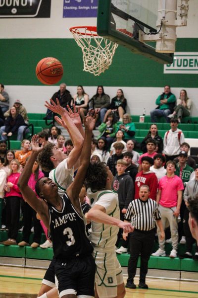 Players jump for the ball. 