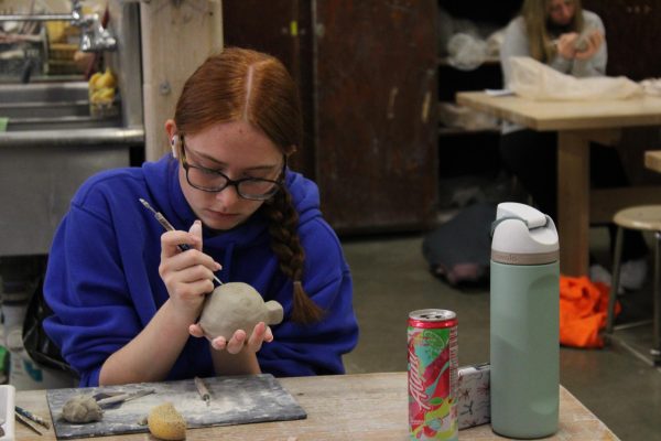 Freshman Baylie Partin paints her ocarina