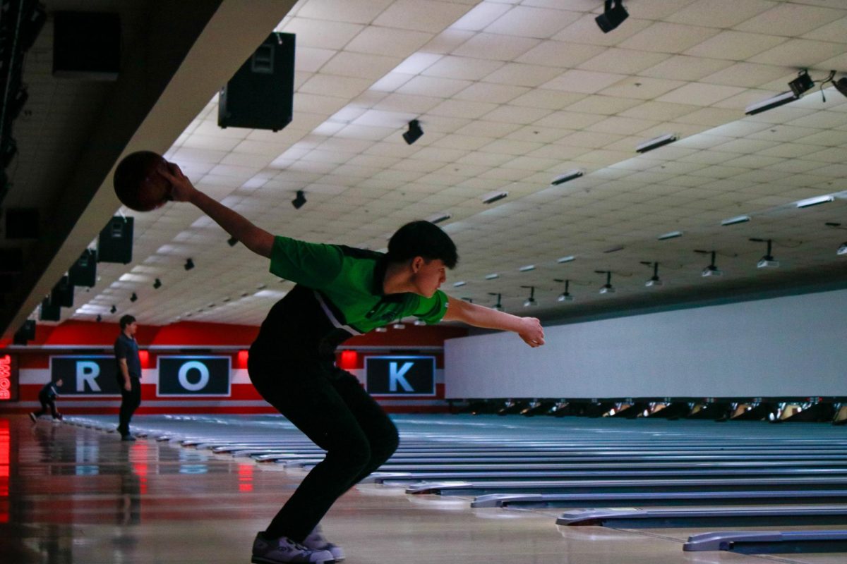 Michael Stanger swings back before delivering the ball.