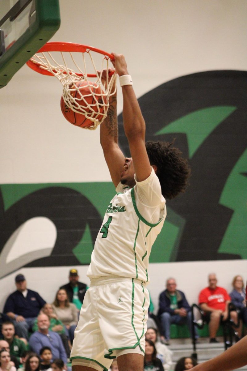 Player dunks the ball