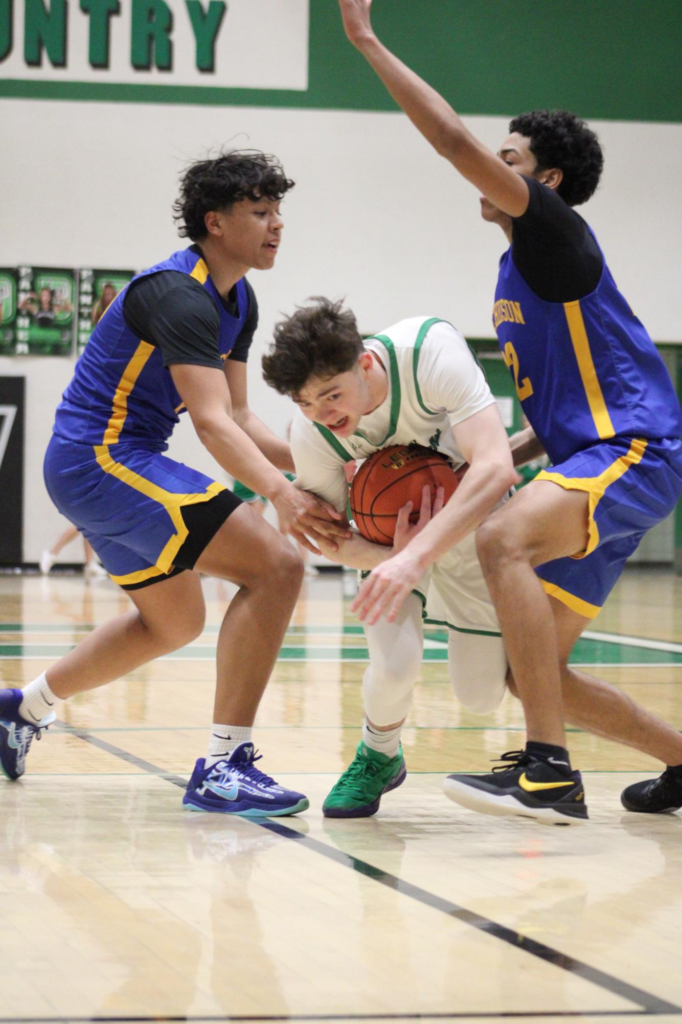 Varsity Boys Basketball vs. Hutchinson (Photos by Kaelyn Kissack)