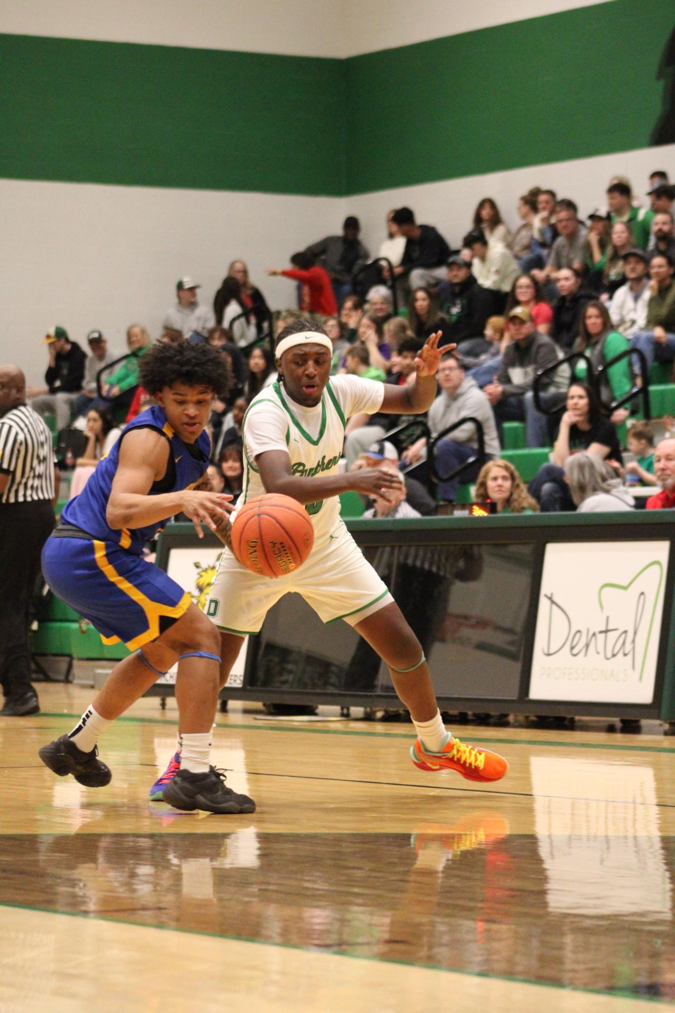 Varsity Boys Basketball vs. Hutchinson (Photos by Kaelyn Kissack)