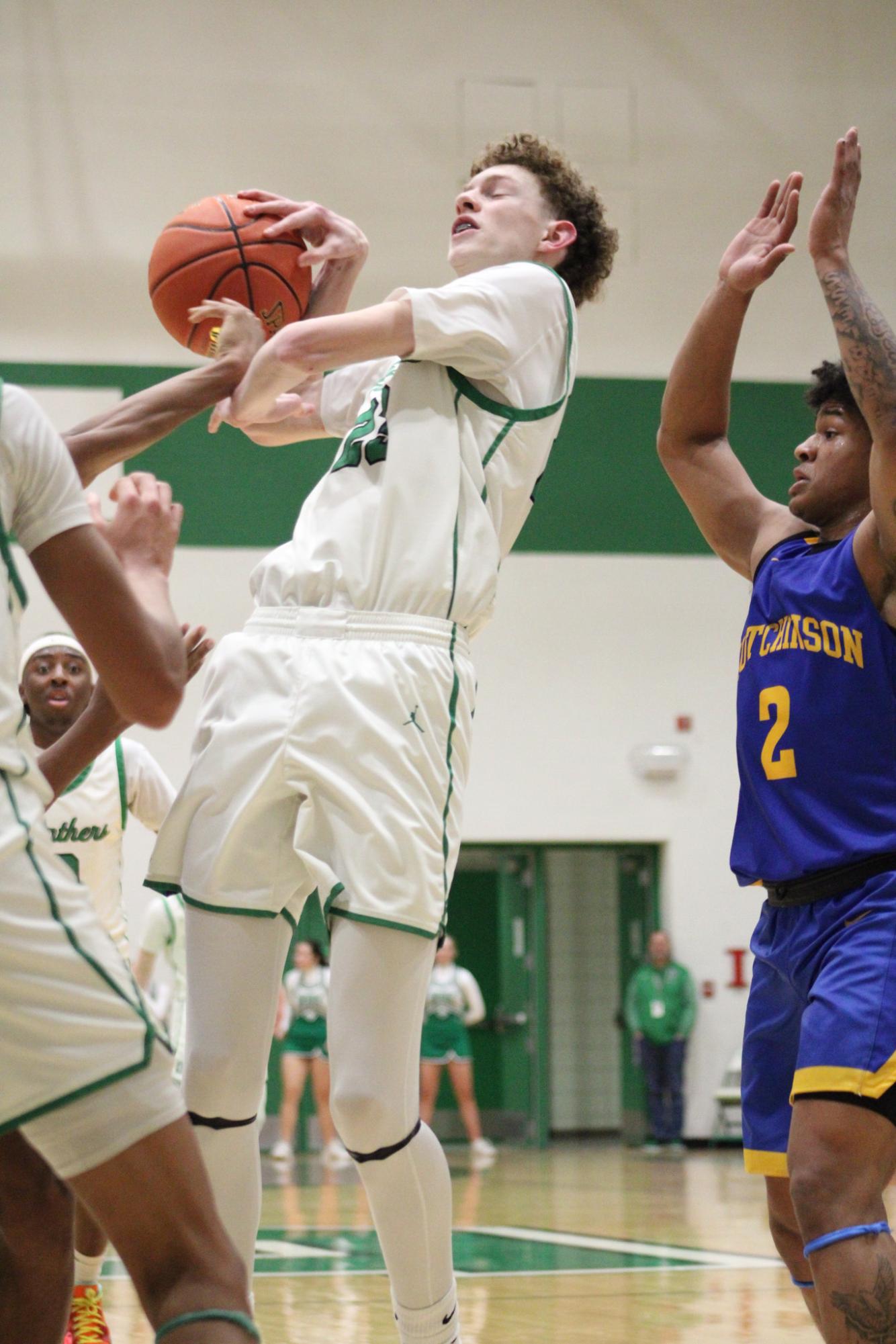 Varsity Boys Basketball vs. Hutchinson (Photos by Kaelyn Kissack)