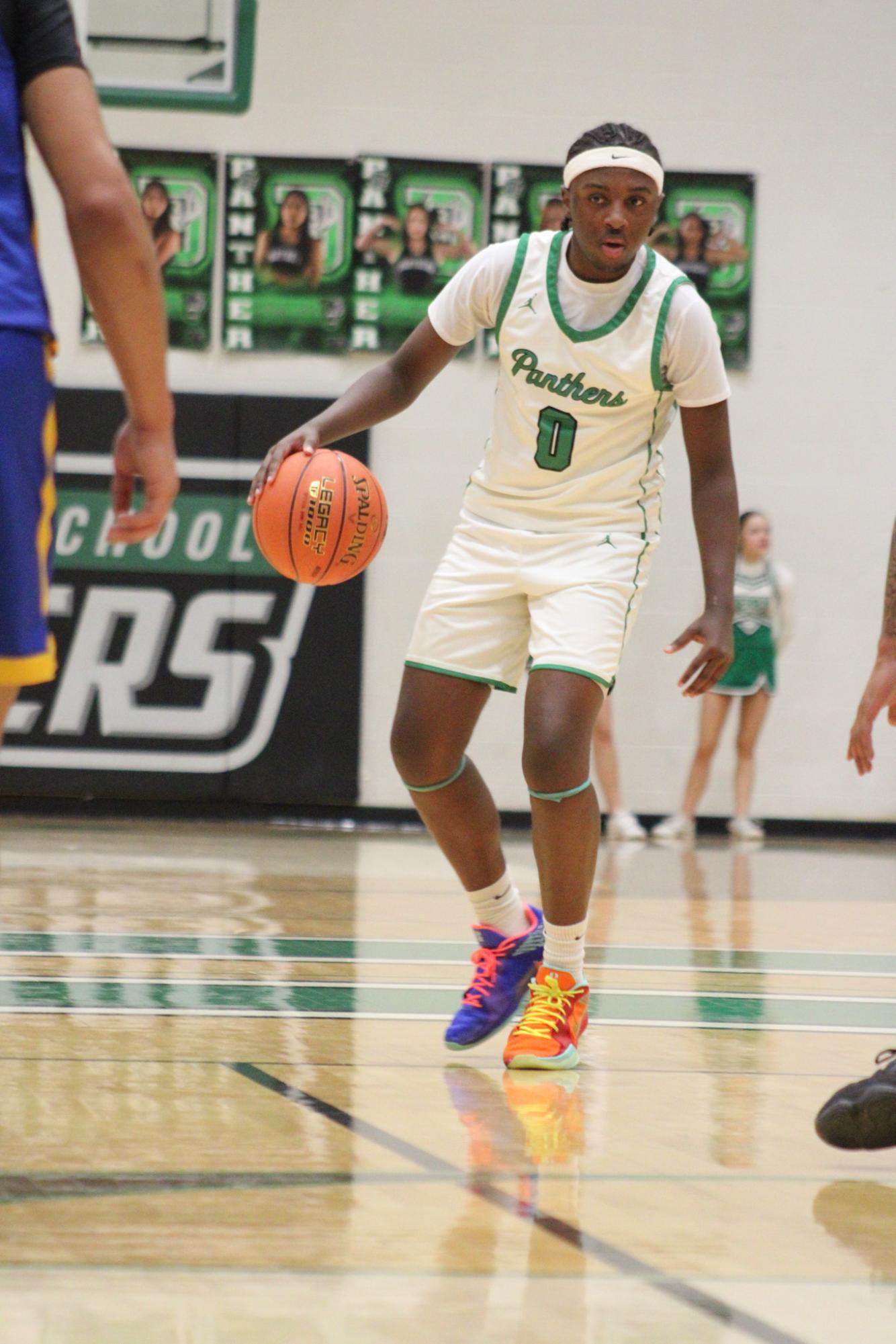 Varsity Boys Basketball vs. Hutchinson (Photos by Kaelyn Kissack)