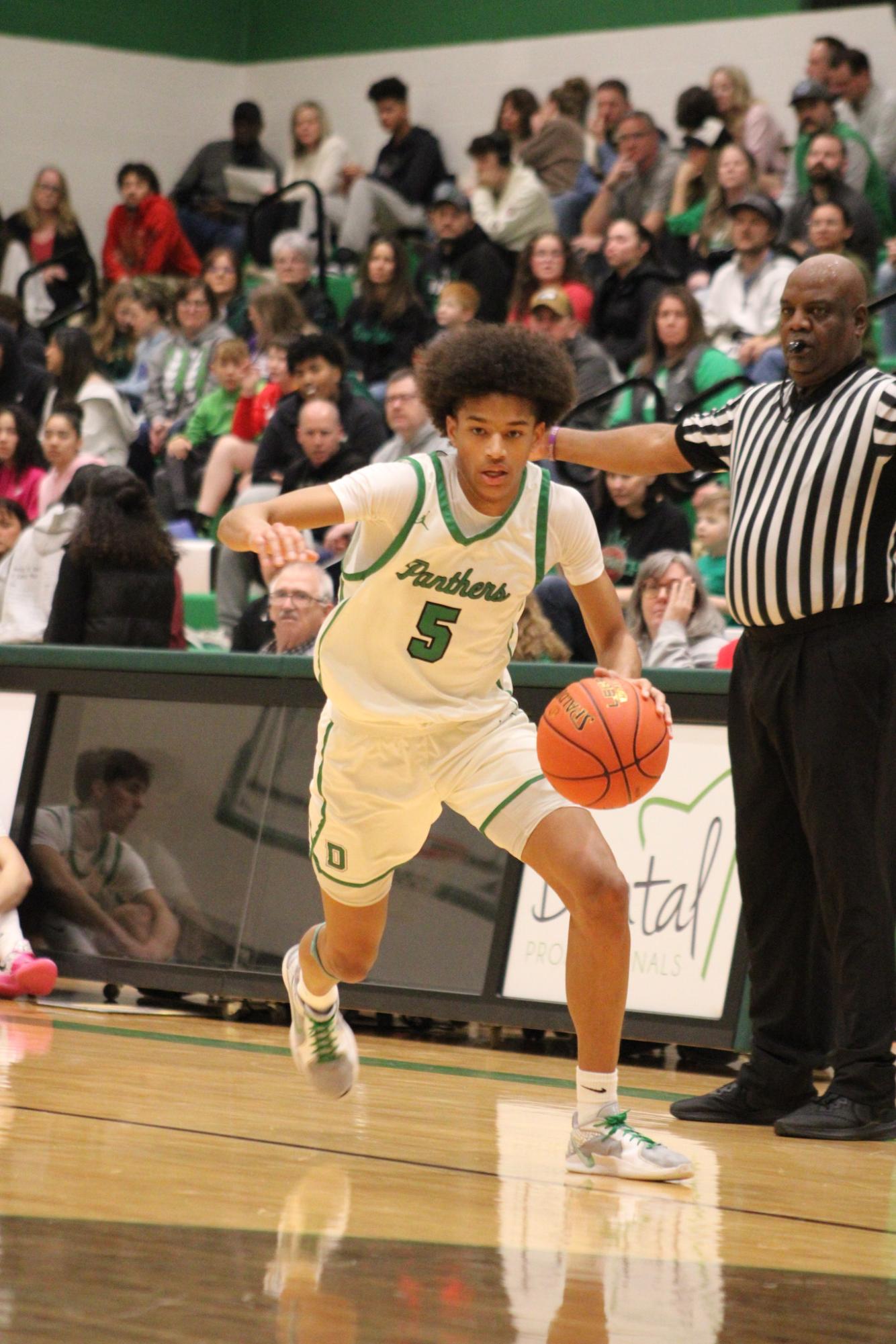 Varsity Boys Basketball vs. Hutchinson (Photos by Kaelyn Kissack)