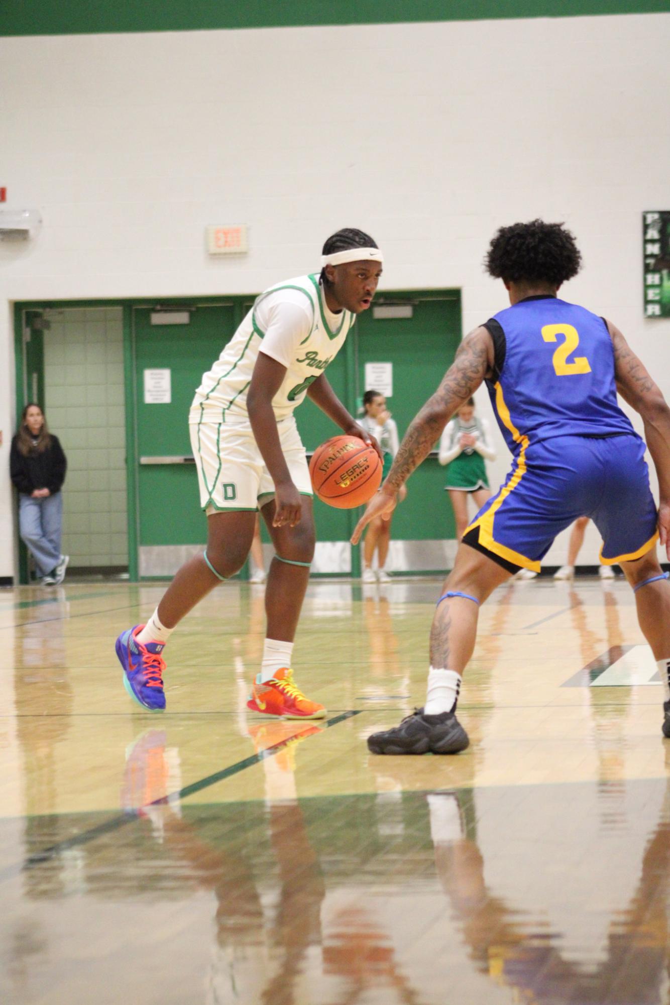 Varsity Boys Basketball vs. Hutchinson (Photos by Kaelyn Kissack)