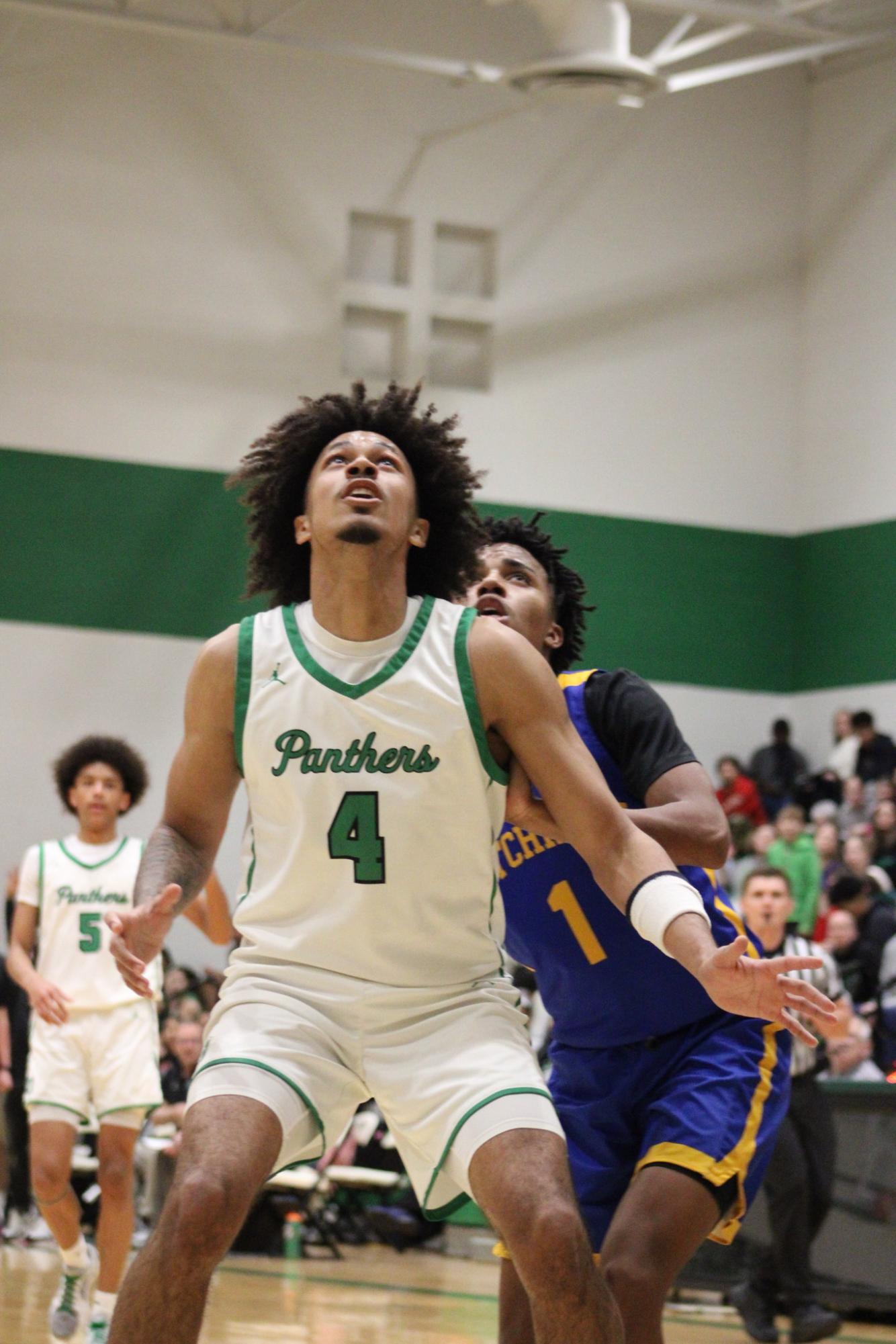 Varsity Boys Basketball vs. Hutchinson (Photos by Kaelyn Kissack)