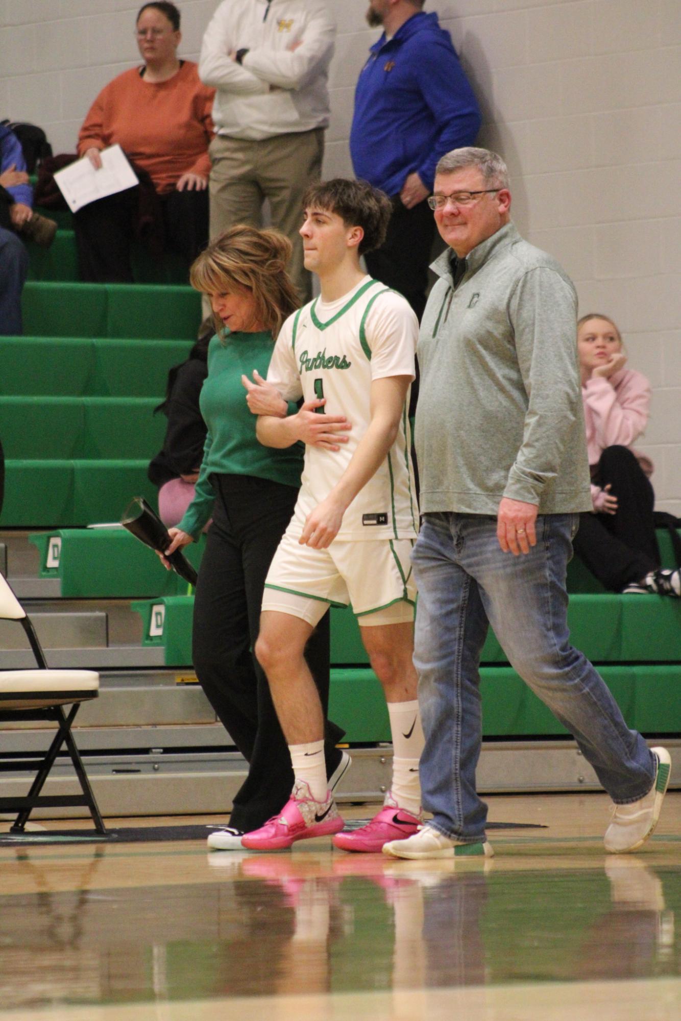 Varsity Boys Basketball vs. Hutchinson (Photos by Kaelyn Kissack)