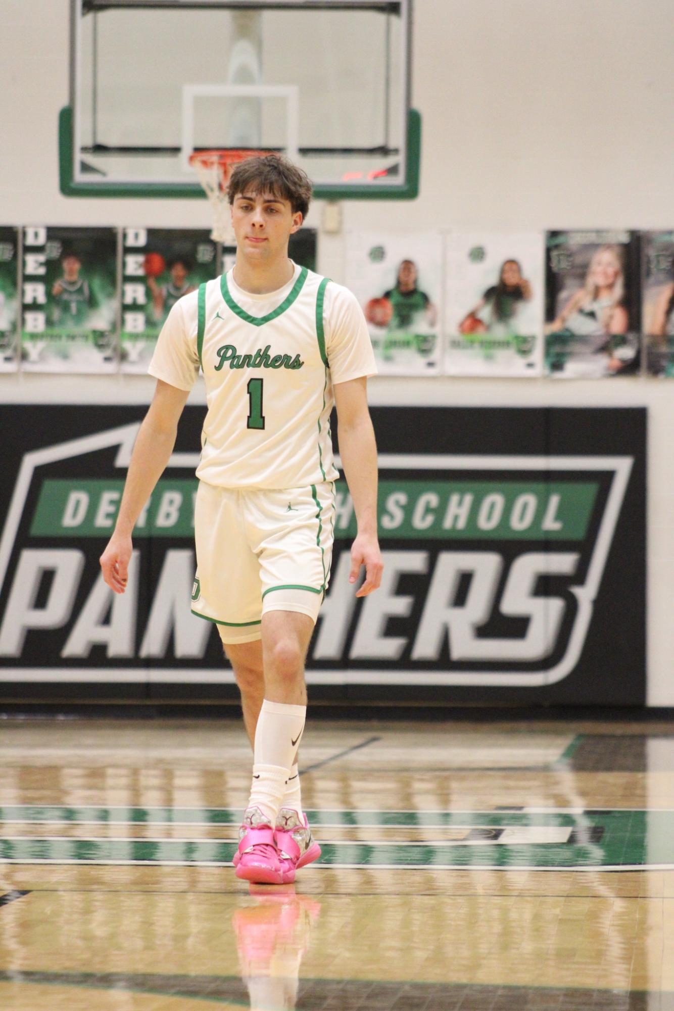 Varsity Boys Basketball vs. Hutchinson (Photos by Kaelyn Kissack)