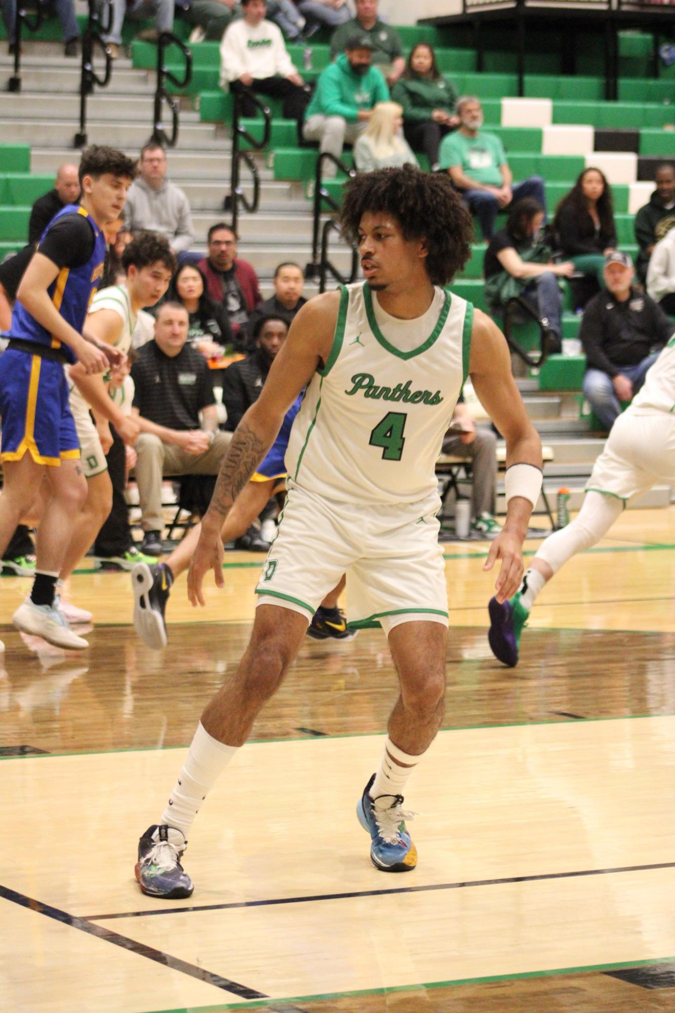 Varsity Boys Basketball vs. Hutchinson (Photos by Kaelyn Kissack)