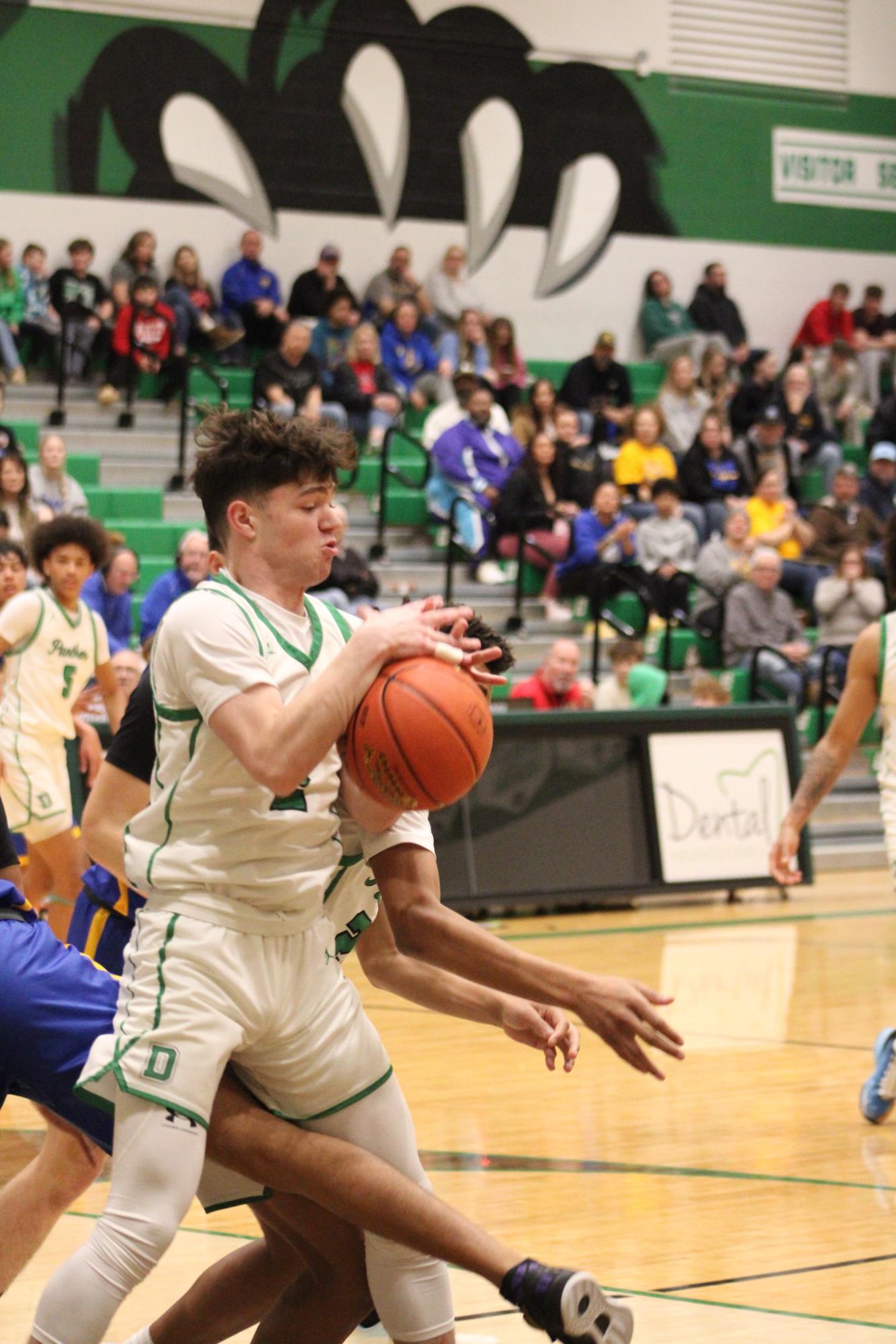 Varsity Boys Basketball vs. Hutchinson (Photos by Kaelyn Kissack)