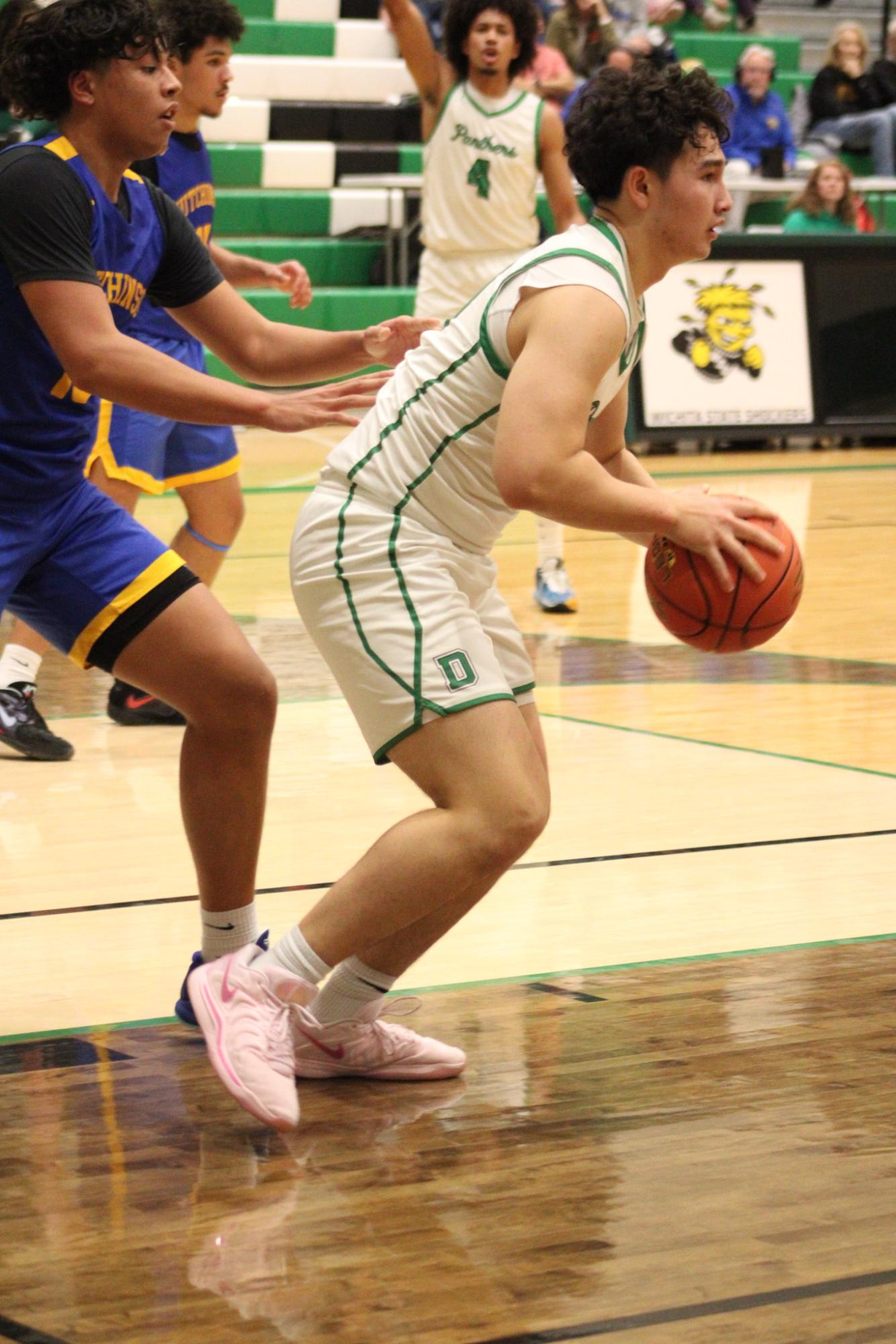 Varsity Boys Basketball vs. Hutchinson (Photos by Kaelyn Kissack)