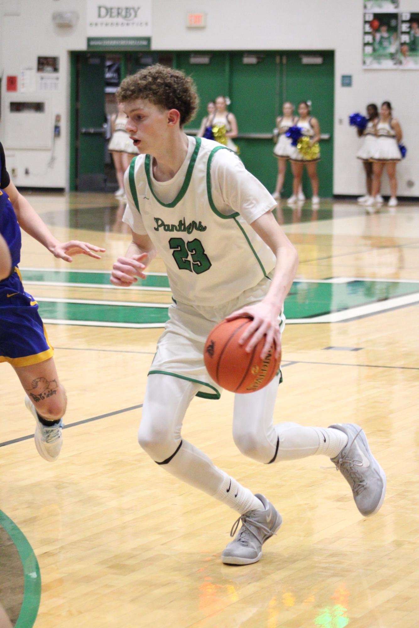 Varsity Boys Basketball vs. Hutchinson (Photos by Kaelyn Kissack)