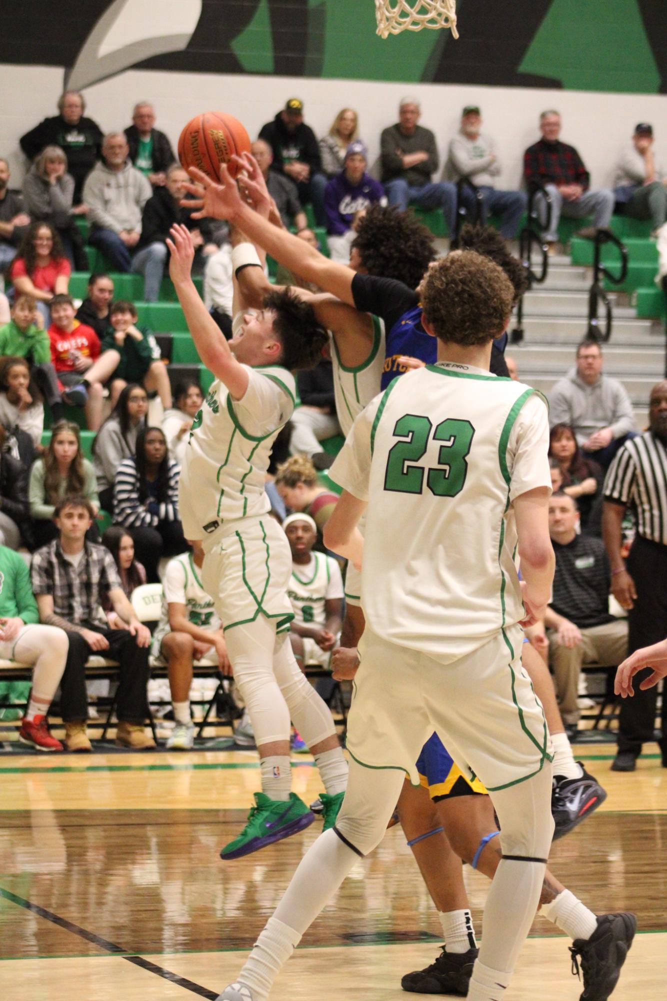 Varsity Boys Basketball vs. Hutchinson (Photos by Kaelyn Kissack)