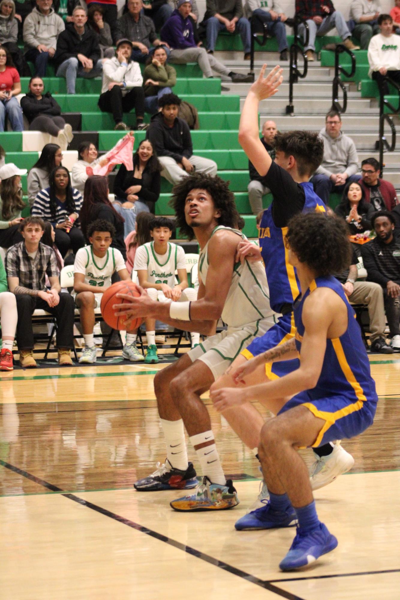 Varsity Boys Basketball vs. Hutchinson (Photos by Kaelyn Kissack)