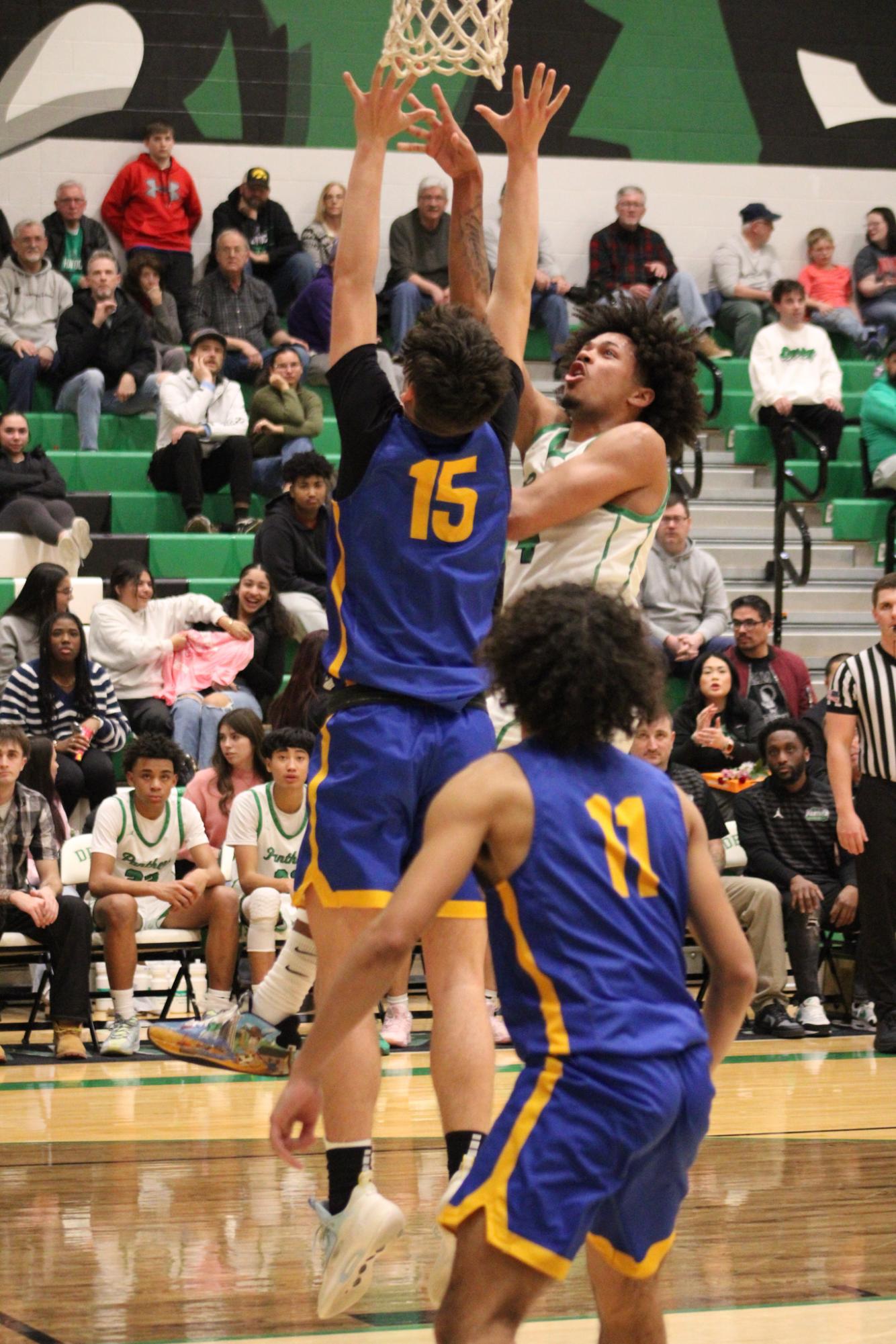 Varsity Boys Basketball vs. Hutchinson (Photos by Kaelyn Kissack)