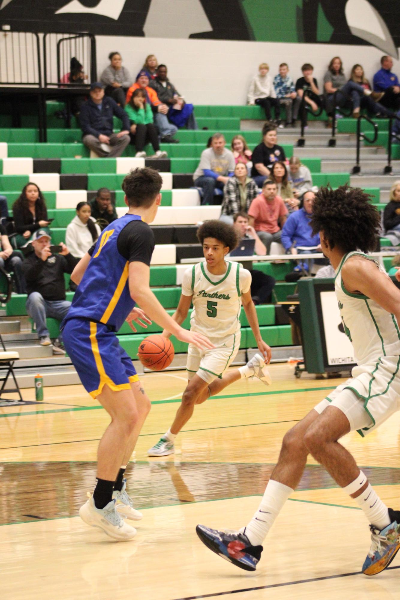 Varsity Boys Basketball vs. Hutchinson (Photos by Kaelyn Kissack)