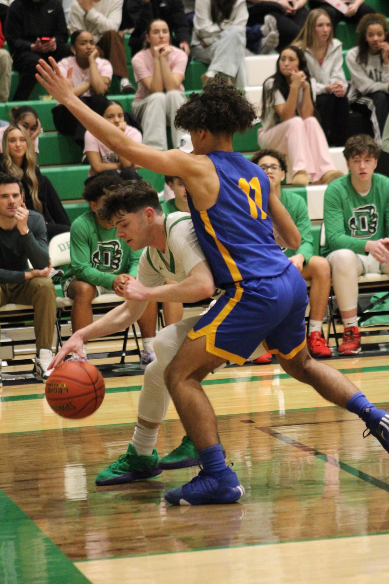 Varsity Boys Basketball vs. Hutchinson (Photos by Kaelyn Kissack)