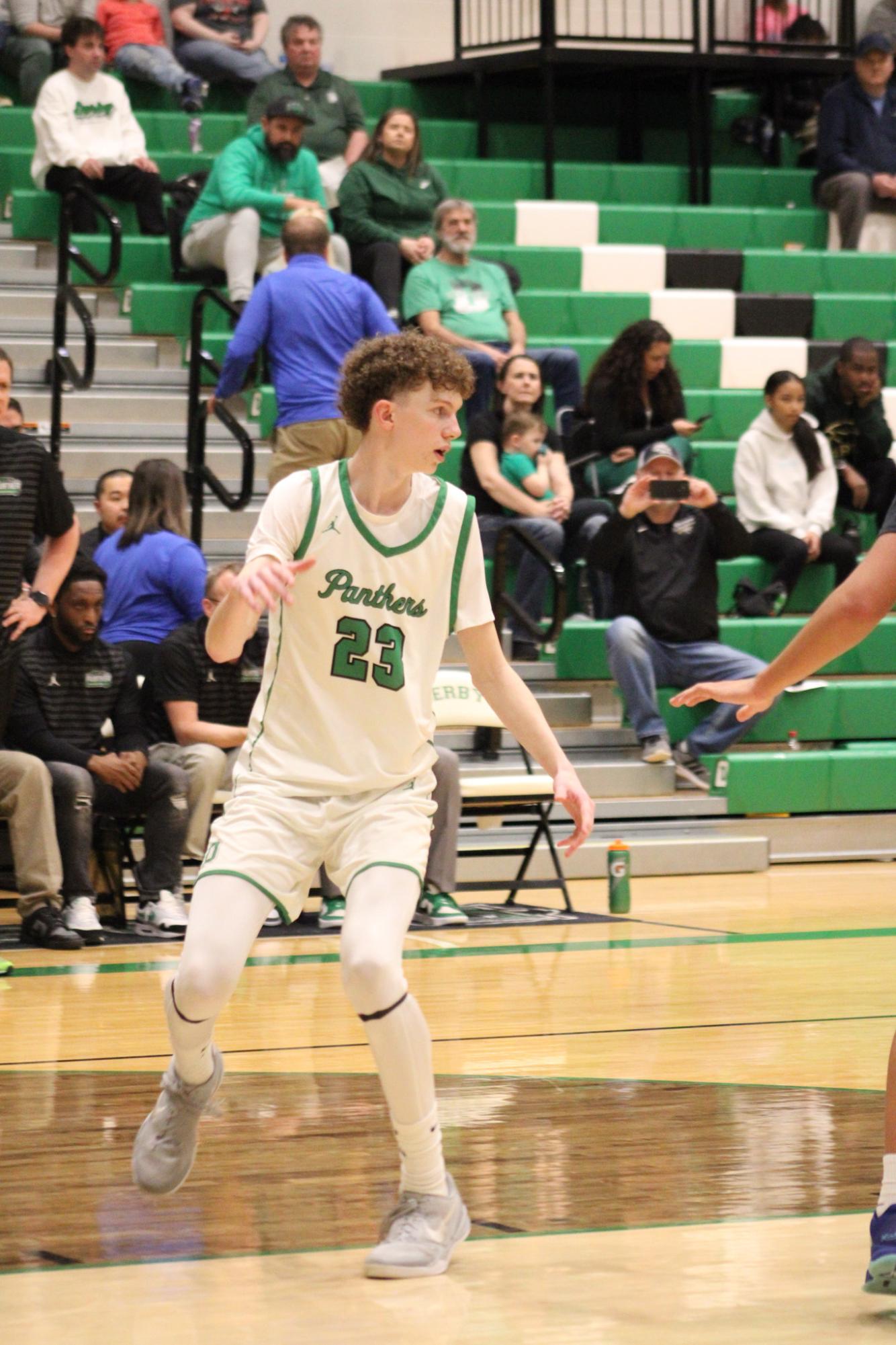 Varsity Boys Basketball vs. Hutchinson (Photos by Kaelyn Kissack)