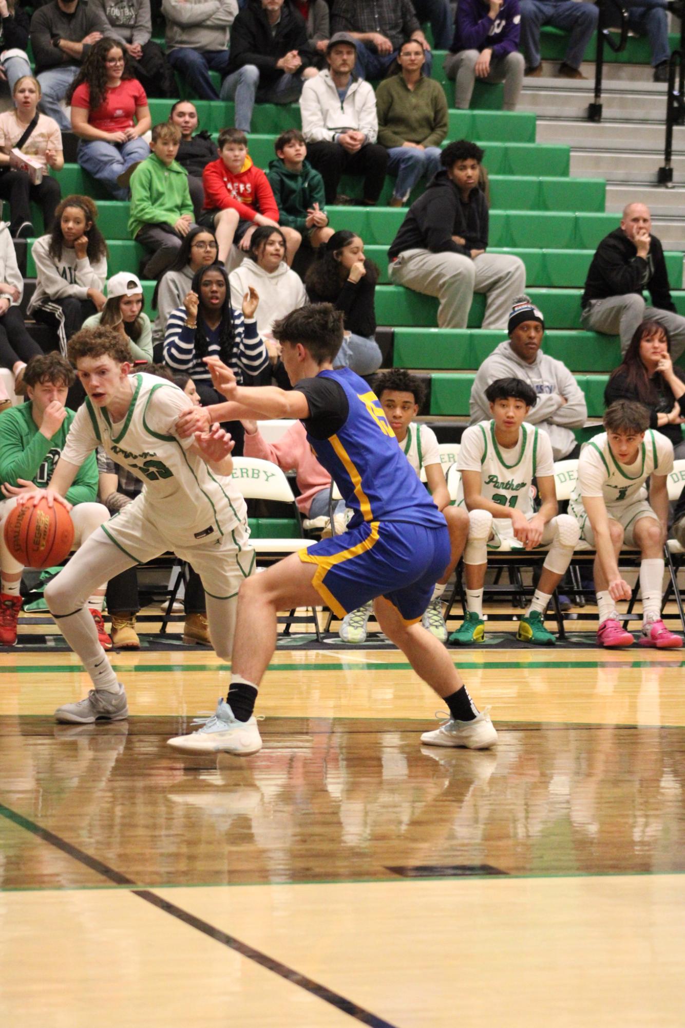 Varsity Boys Basketball vs. Hutchinson (Photos by Kaelyn Kissack)