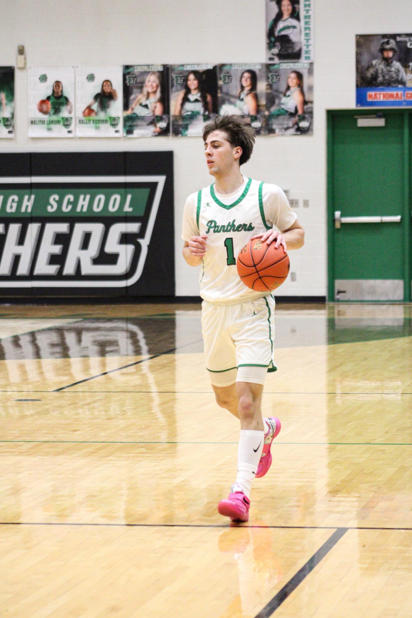 Varsity Boys Basketball vs. Hutchinson (Photos by Kaelyn Kissack)