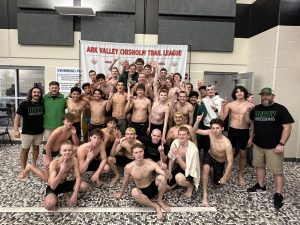 Members of the DHS swim team pose for a photo after capturing their seventh consecutive Ark Valley Chisholm Trail League title, earning a total of 495 points. The team, guided by head coach Jimmy Adams, assistant coaches Danny Smith and Samuel Pinkerton.