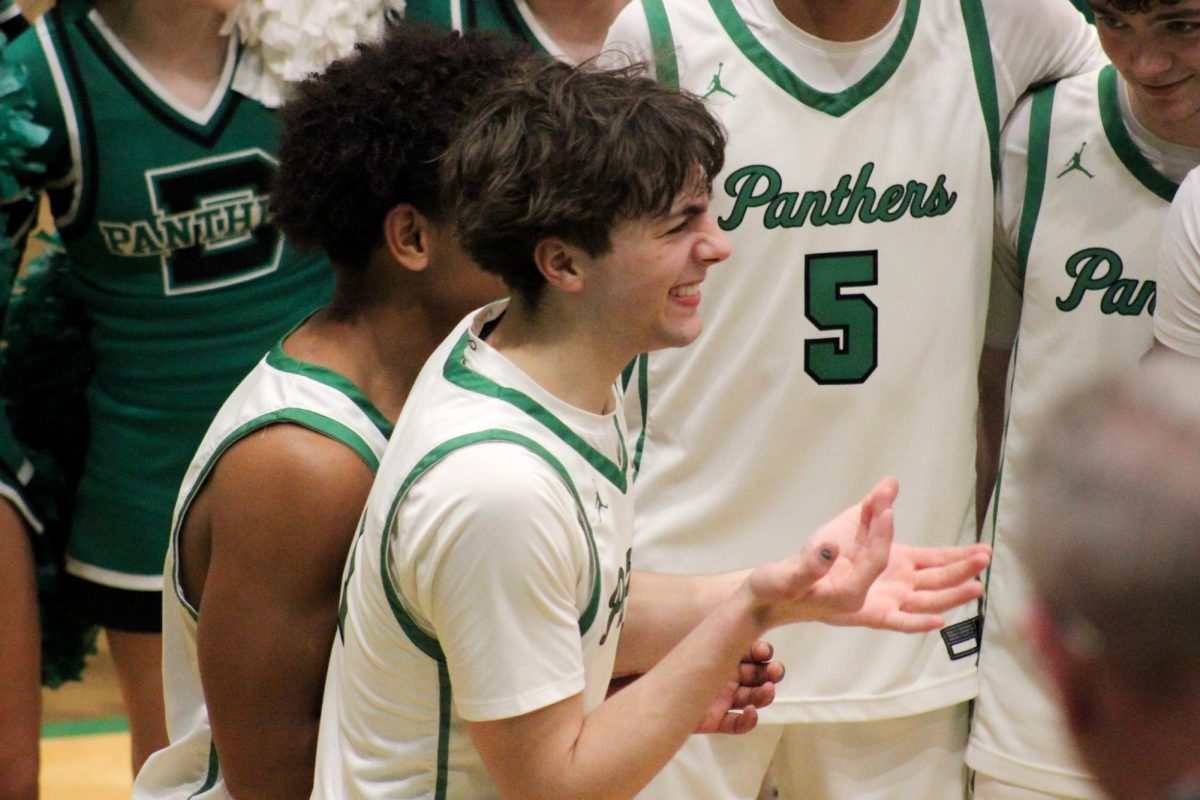 Senior Braydon Smith laughs after the game is over.