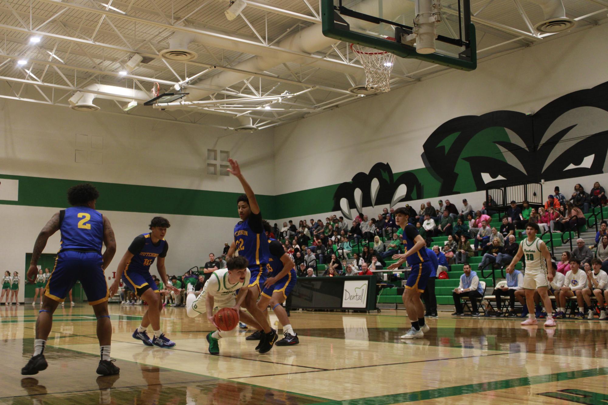 Varsity Boys basketball vs. Hutchinson (Photos by Tripp Stratton)