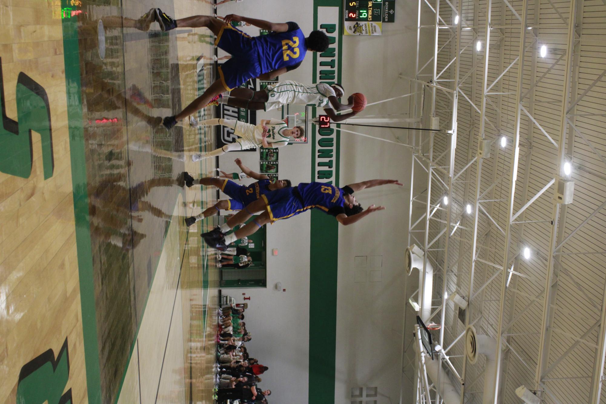 Varsity Boys basketball vs. Hutchinson (Photos by Tripp Stratton)