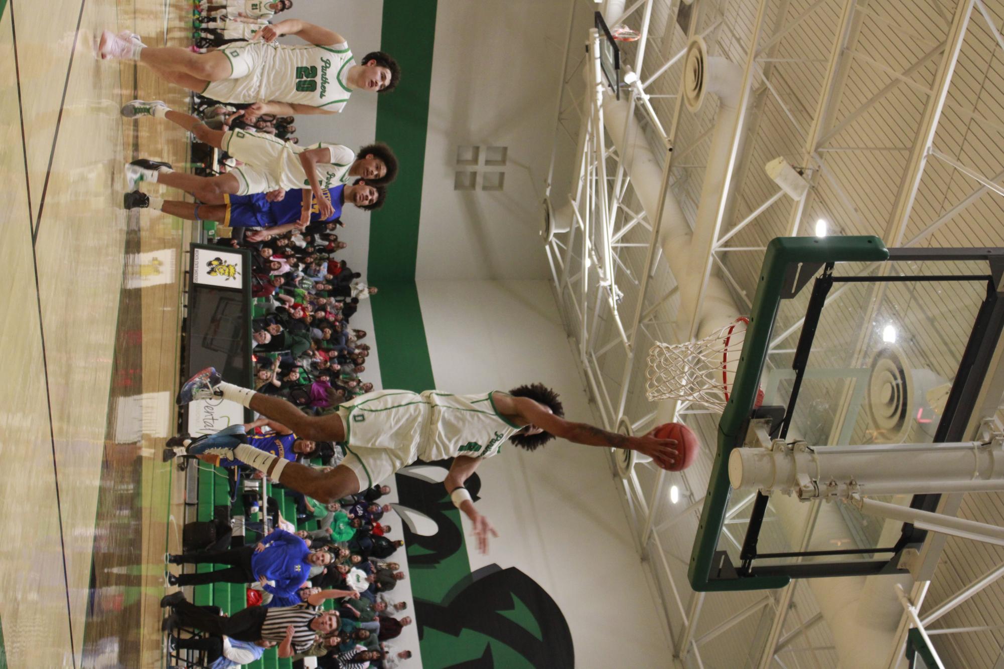 Varsity Boys basketball vs. Hutchinson (Photos by Tripp Stratton)