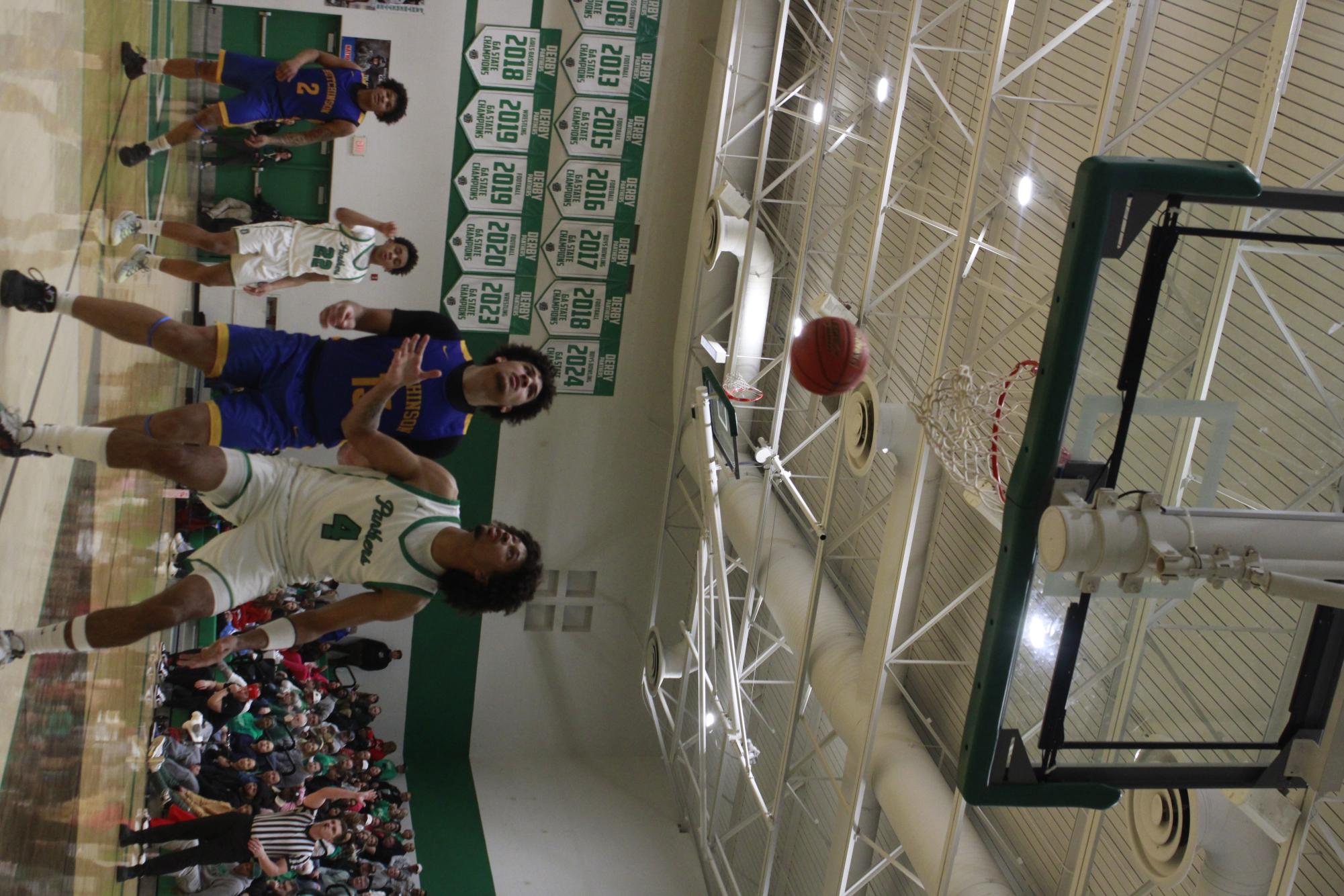 Varsity Boys basketball vs. Hutchinson (Photos by Tripp Stratton)