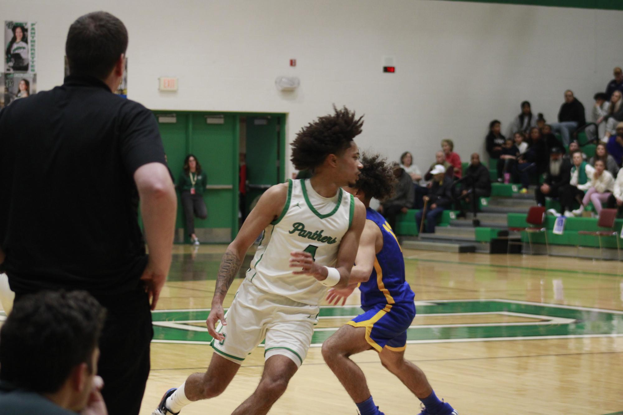 Varsity Boys basketball vs. Hutchinson (Photos by Tripp Stratton)