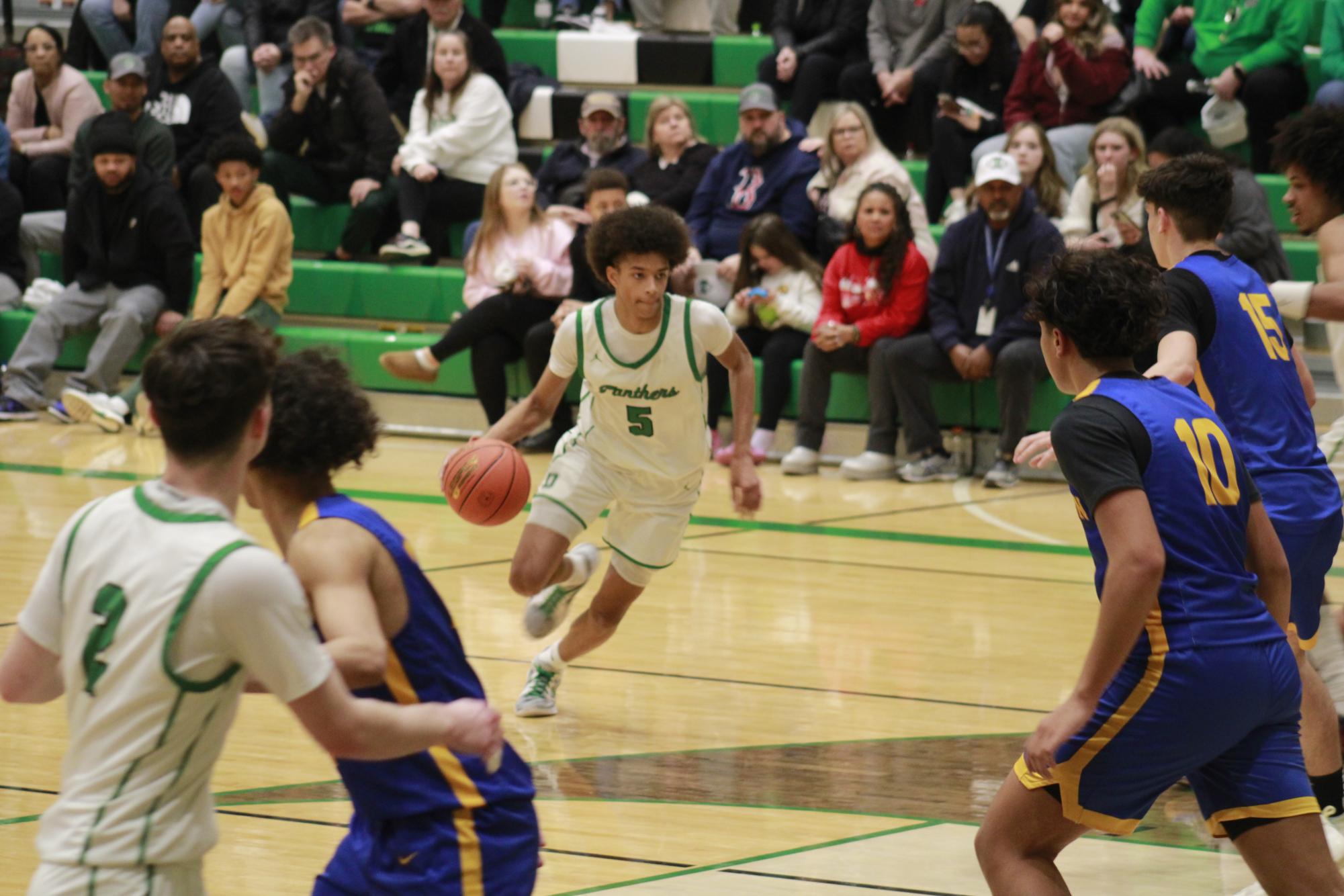 Varsity Boys basketball vs. Hutchinson (Photos by Tripp Stratton)