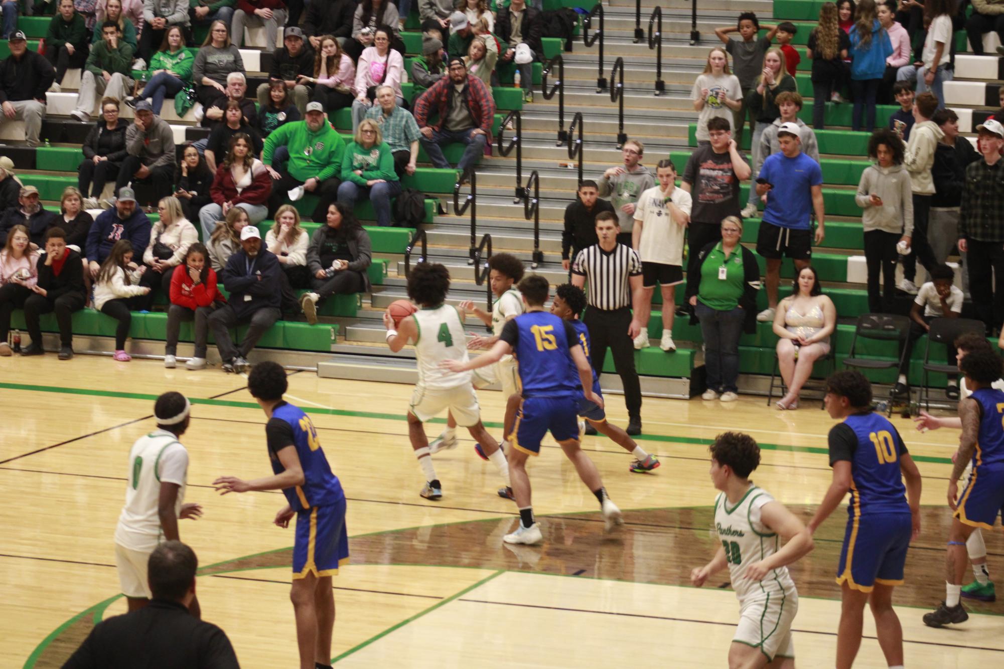 Varsity Boys basketball vs. Hutchinson (Photos by Tripp Stratton)