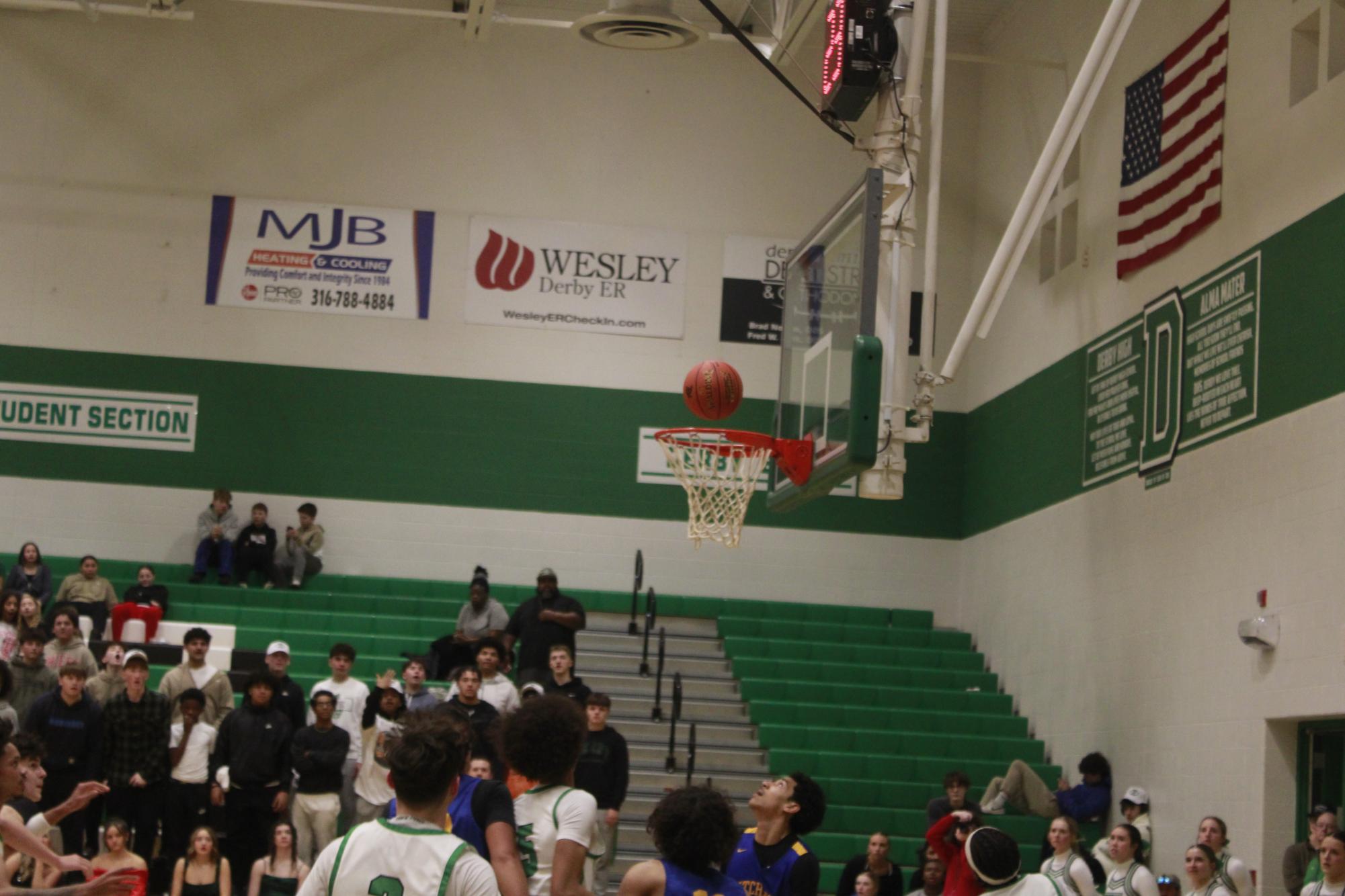 Varsity Boys basketball vs. Hutchinson (Photos by Tripp Stratton)