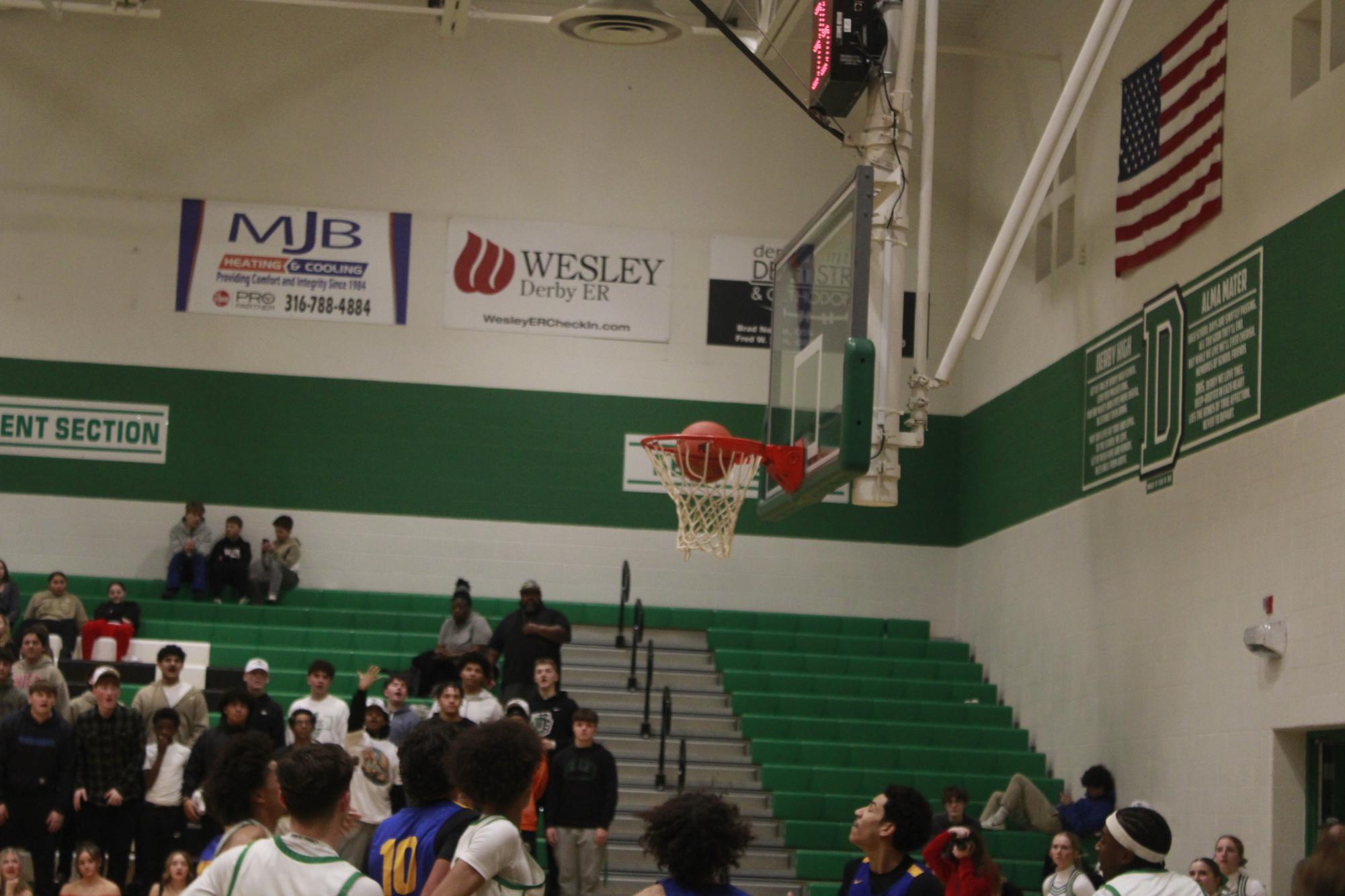 Varsity Boys basketball vs. Hutchinson (Photos by Tripp Stratton)