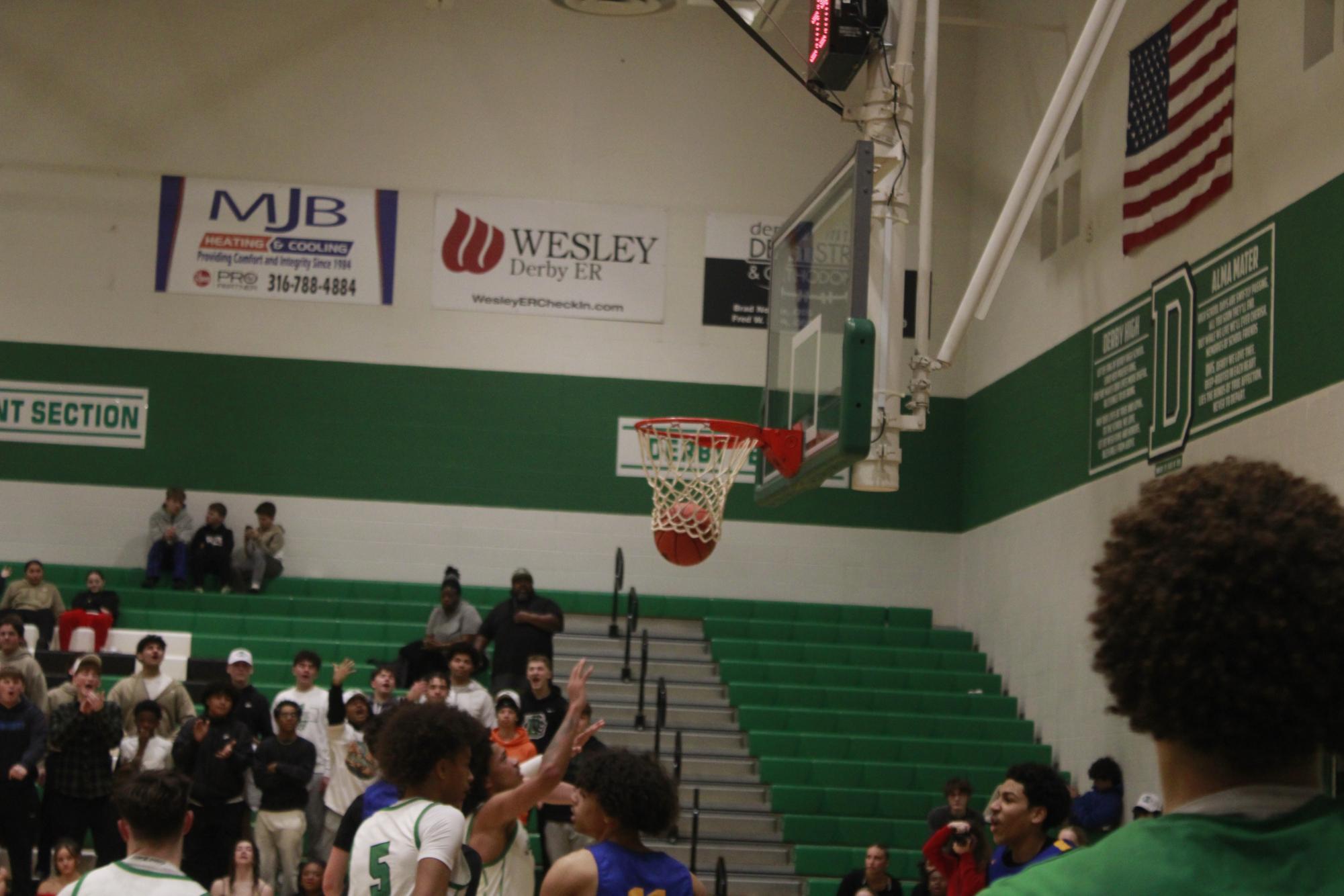 Varsity Boys basketball vs. Hutchinson (Photos by Tripp Stratton)