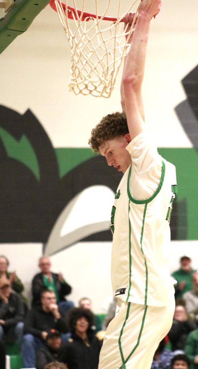 Player dunks the ball