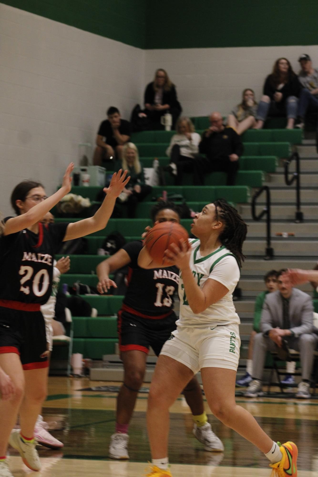 Girls varsity basketball vs. Maize (Photos by France Cueto)