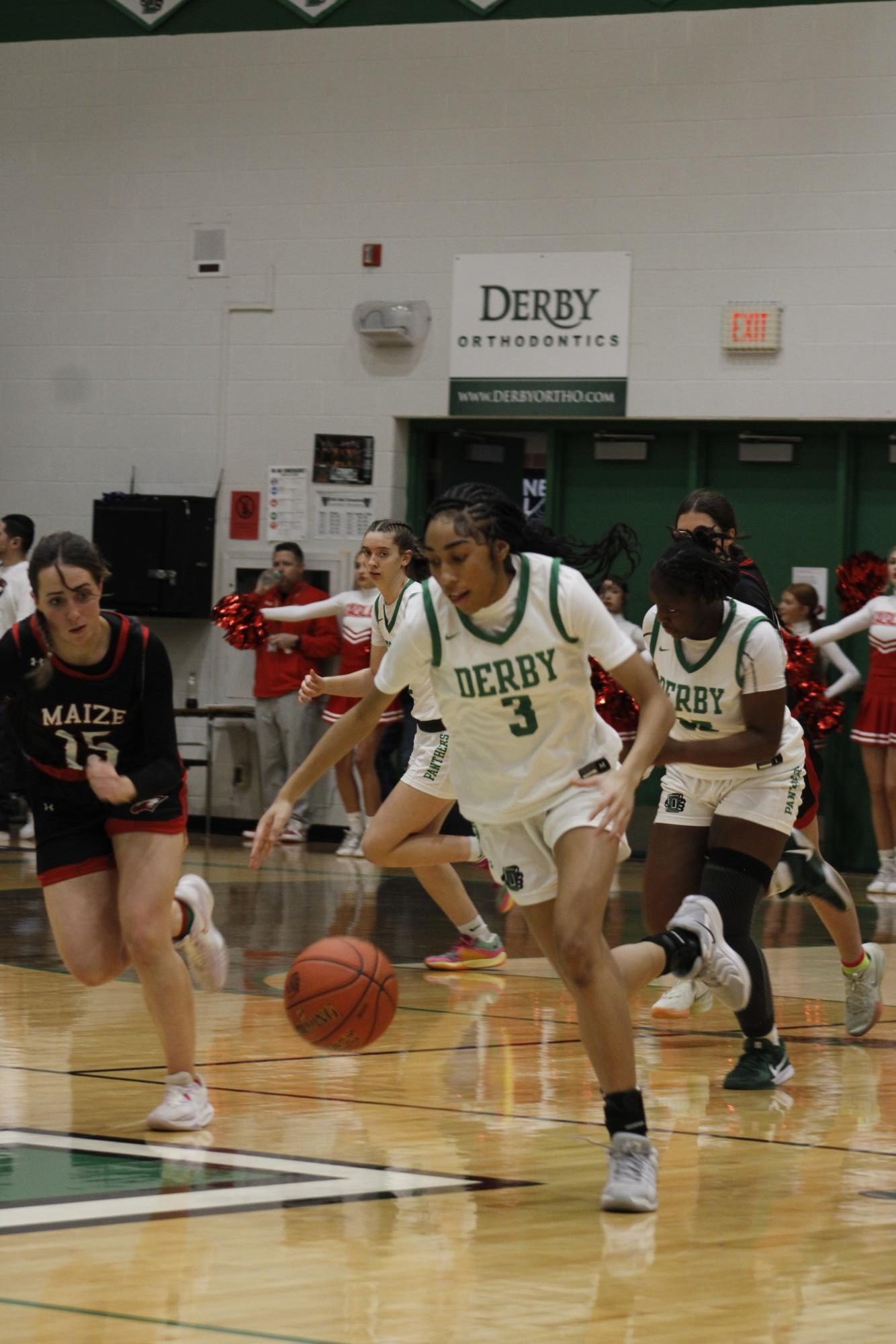 Girls varsity basketball vs. Maize (Photos by France Cueto)