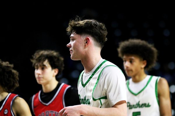 Navigation to Story: Boys state basketball vs. Olathe North (Photos by Maggie Elliott)